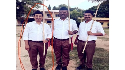 Karnataka Official Suspended for Participating in RSS March, Igniting Political Firestorm