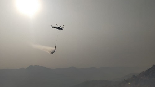 INDIAN AIR FORCE CONDUCTS ROUND-THE-CLOCK AERIAL FIREFIGHTING OPERATIONS IN KASAULI
